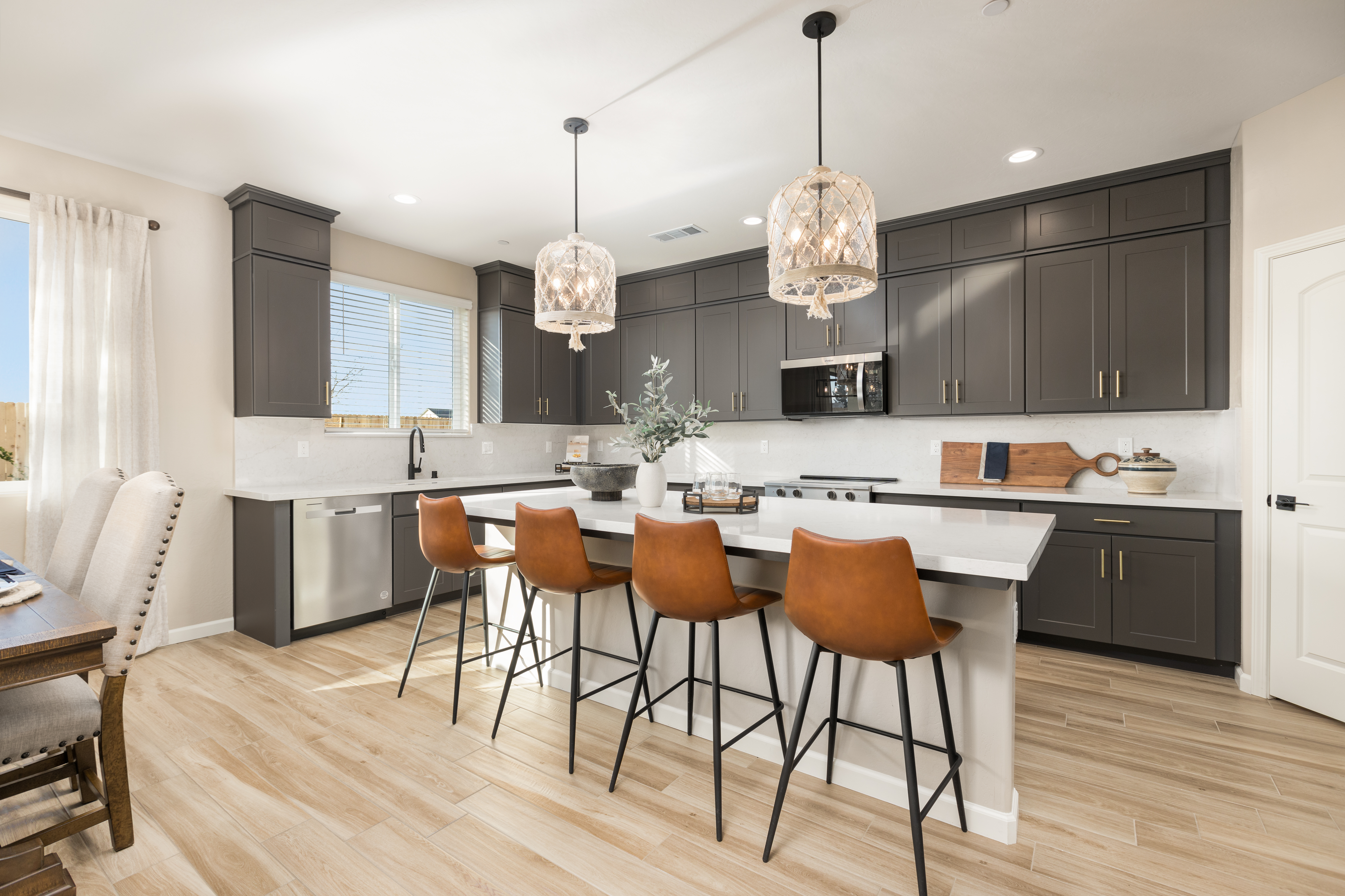 Carlton kitchen — dark cabinetry, quartz island